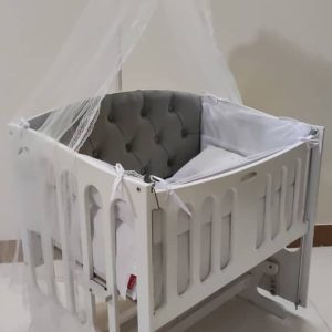 گهواره چوبی پارچه کرمی لمسه نسکافه ای بدنه سفید دیوانکو Divanco